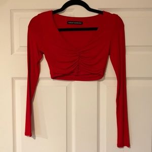Naked wardrobe long sleeve ruched crop top
